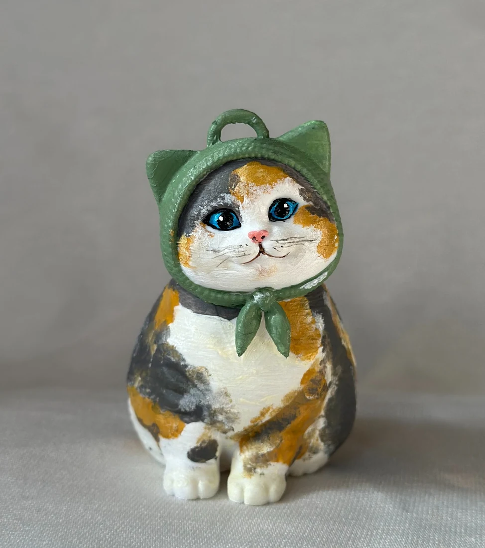 Вариант раскраски фигурки котика